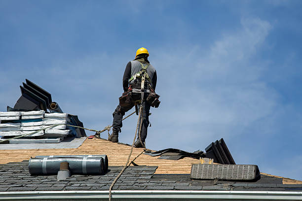 Professional Roof Replacement technician working in Castile, NY